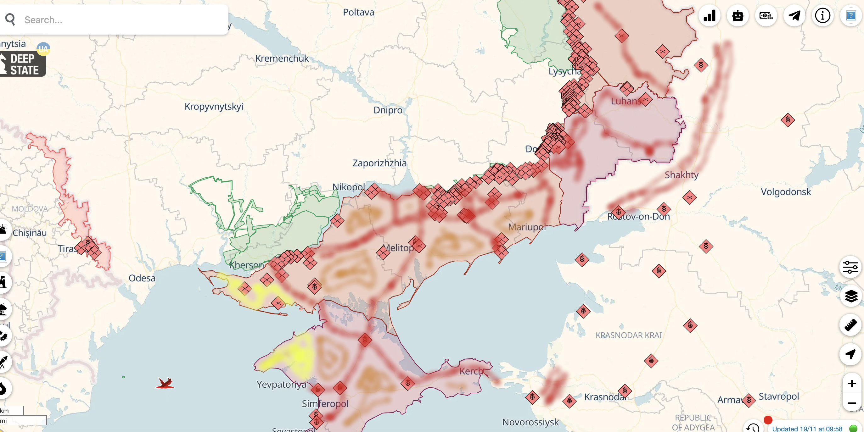 A map of the occupied territories with red air brushed along the train lines, which go through most marked Russian troop locations. Areas near this and Russia are coloured red while gaps between them are a dark orange. To the East, where the land is further away from the rail lines and against the sea, the map is coloured yellow. The picture resembles a blood circulatory system.